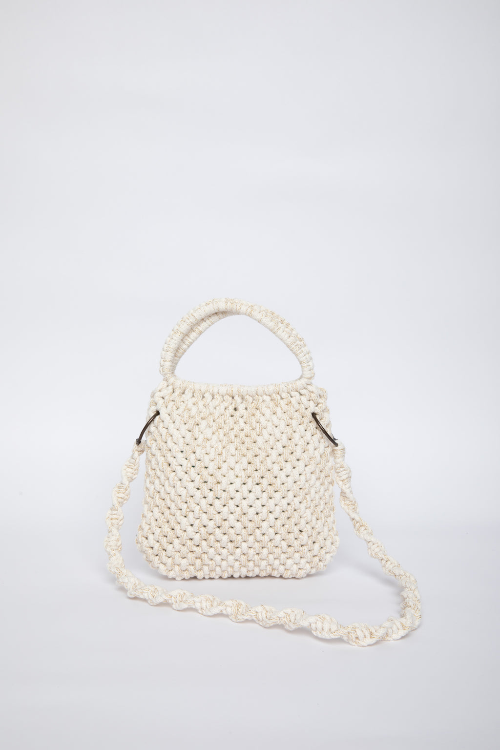 White woven handbag on a light gray background