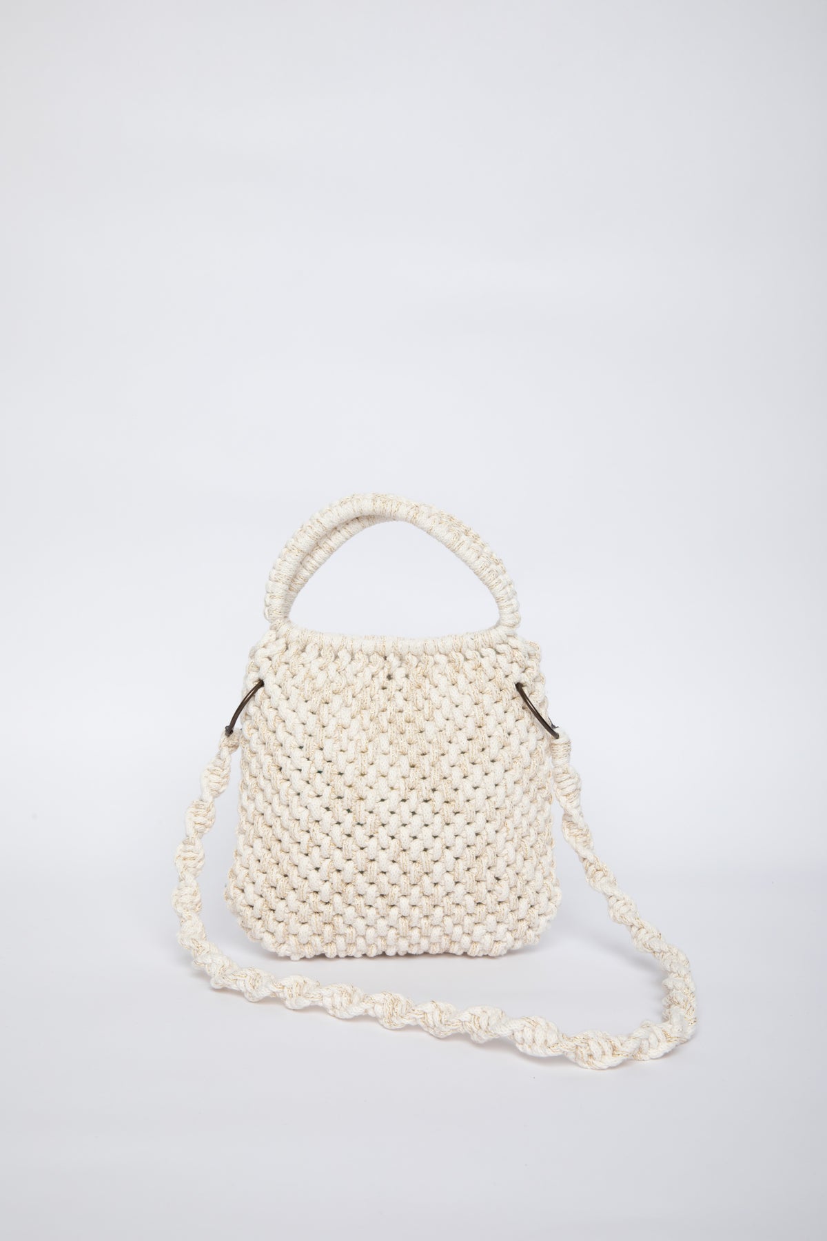 White woven handbag on a light gray background